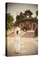 Woman Wearing Ao Dai Dress-Ian Trower-Stretched Canvas