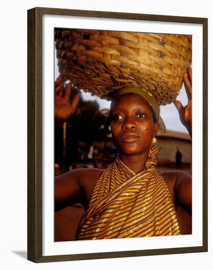 Woman Wearing Gold Fabric Dress and Carrying Basket, Kabile, Brong-Ahafo Region, Ghana-Alison Jones-Framed Premium Photographic Print