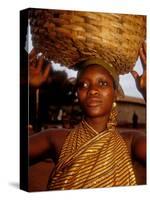Woman Wearing Gold Fabric Dress and Carrying Basket, Kabile, Brong-Ahafo Region, Ghana-Alison Jones-Stretched Canvas
