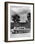 Woman with a 1957 Cadillac Coupe De Ville-null-Framed Photographic Print