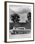 Woman with a 1957 Cadillac Coupe De Ville-null-Framed Photographic Print