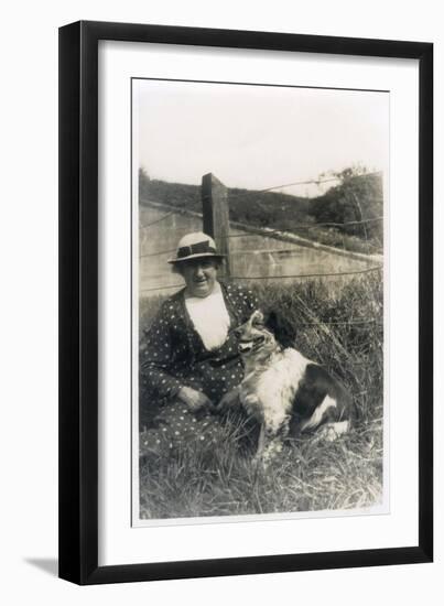 Woman with a Dog in a Field-null-Framed Premium Photographic Print