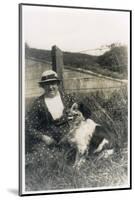 Woman with a Dog in a Field-null-Mounted Photographic Print