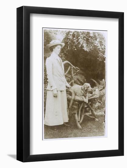 Woman with a Dog in a Garden-null-Framed Photographic Print