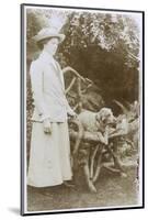 Woman with a Dog in a Garden-null-Mounted Photographic Print