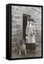 Woman with a Dog Outside a House-null-Framed Stretched Canvas