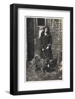 Woman with a Dog Outside a House-null-Framed Photographic Print