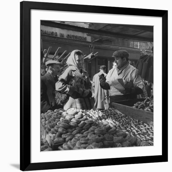 Woman with a Small Terrier Buying Bagels at a Market Stall, Possibly London, C.1945-50-null-Framed Giclee Print