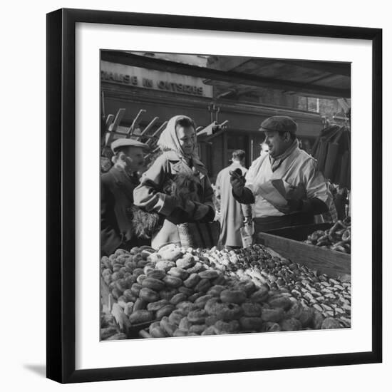 Woman with a Small Terrier Buying Bagels at a Market Stall, Possibly London, C.1945-50-null-Framed Giclee Print