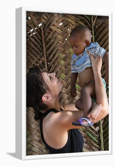 Woman with an African child, Lome, Togo-Godong-Framed Photographic Print