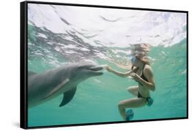 Woman with Bottlenose Dolphin-Stuart Westmorland-Framed Stretched Canvas