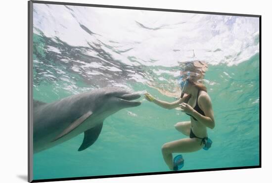 Woman with Bottlenose Dolphin-Stuart Westmorland-Mounted Photographic Print