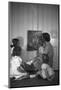 Woman with Children Looking at Picture-Philip Gendreau-Mounted Photographic Print