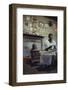 Woman with Cotton Stalks Beside a Wood-Burning Stove, Edisto Island, South Carolina, 1956-Walter Sanders-Framed Photographic Print