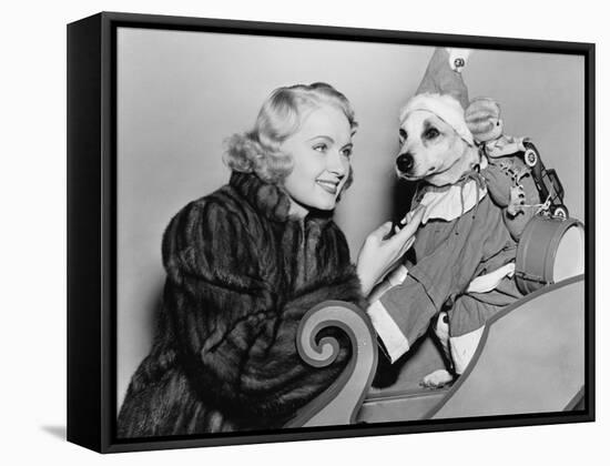 Woman with Dog in Christmas Outfit-null-Framed Stretched Canvas