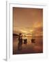 Woman with lamp and baskets on the beach, Phuket, Thailand-Luca Tettoni-Framed Premium Photographic Print