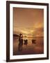 Woman with lamp and baskets on the beach, Phuket, Thailand-Luca Tettoni-Framed Photographic Print