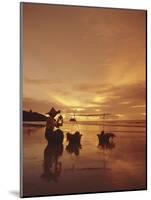 Woman with lamp and baskets on the beach, Phuket, Thailand-Luca Tettoni-Mounted Photographic Print