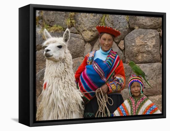 Woman with Llama, Boy, and Parrot, Sacsayhuaman Inca Ruins, Cusco, Peru-Dennis Kirkland-Framed Stretched Canvas