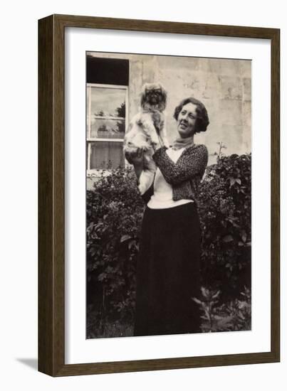 Woman with Pekingese Dog in a Garden-null-Framed Photographic Print