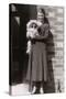 Woman with Pekingese Dog Outside a House-null-Stretched Canvas