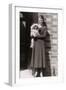 Woman with Pekingese Dog Outside a House-null-Framed Premium Photographic Print