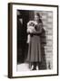 Woman with Pekingese Dog Outside a House-null-Framed Photographic Print