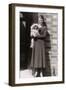 Woman with Pekingese Dog Outside a House-null-Framed Photographic Print