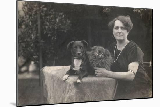 Woman with Two Dogs in a Garden-null-Mounted Photographic Print