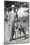 Woman with Two Dogs on a Country Lane-null-Mounted Photographic Print