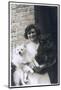 Woman with Two Dogs Outside a House-null-Mounted Photographic Print