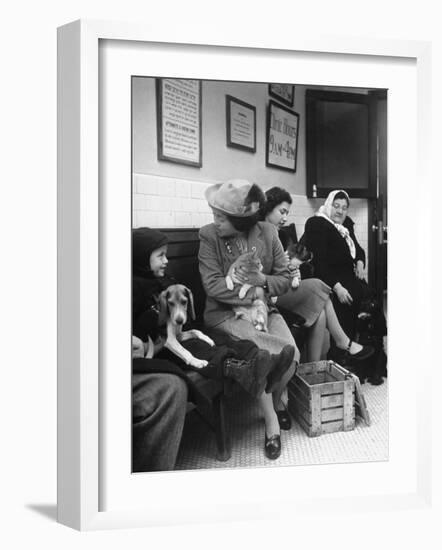 Women and Children Holding Pets While Waiting to See Veterinarian-Nina Leen-Framed Photographic Print