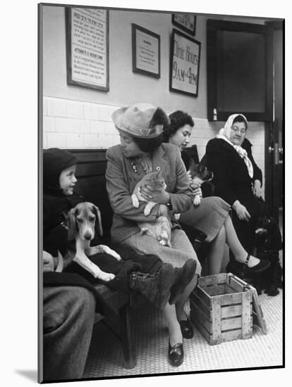 Women and Children Holding Pets While Waiting to See Veterinarian-Nina Leen-Mounted Photographic Print