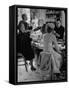 Women at a Powder Bar in Department Store Being Advised on Make Up by Operators-Leonard Mccombe-Framed Stretched Canvas