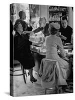 Women at a Powder Bar in Department Store Being Advised on Make Up by Operators-Leonard Mccombe-Stretched Canvas