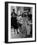 Women at a Powder Bar in Department Store Being Advised on Make Up by Operators-Leonard Mccombe-Framed Photographic Print