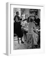 Women at a Powder Bar in Department Store Being Advised on Make Up by Operators-Leonard Mccombe-Framed Photographic Print