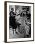 Women at a Powder Bar in Department Store Being Advised on Make Up by Operators-Leonard Mccombe-Framed Photographic Print