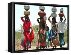 Women Carry Water at Lat Village-null-Framed Stretched Canvas