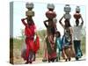 Women Carry Water at Lat Village-null-Stretched Canvas