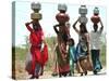 Women Carry Water at Lat Village-null-Stretched Canvas