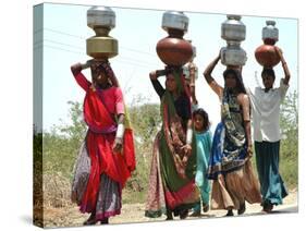 Women Carry Water at Lat Village-null-Stretched Canvas