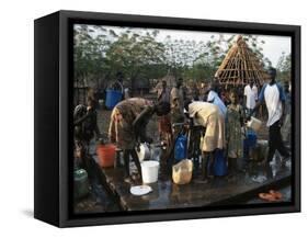 Women Collecting Water at the Dimma Refugee Camp, Ethiopia, Africa-D H Webster-Framed Stretched Canvas