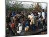 Women Collecting Water at the Dimma Refugee Camp, Ethiopia, Africa-D H Webster-Mounted Photographic Print