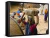 Women Construction Workers Prepare Concrete at a Site for a Multiplex Complex-null-Framed Stretched Canvas