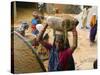 Women Construction Workers Prepare Concrete at a Site for a Multiplex Complex-null-Stretched Canvas