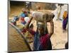 Women Construction Workers Prepare Concrete at a Site for a Multiplex Complex-null-Mounted Photographic Print