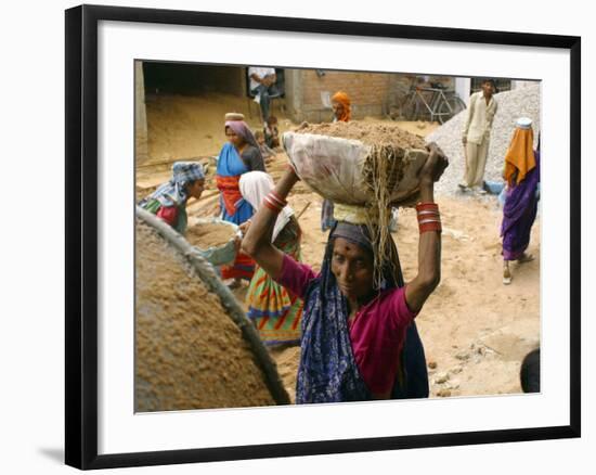 Women Construction Workers Prepare Concrete at a Site for a Multiplex Complex-null-Framed Photographic Print