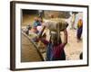 Women Construction Workers Prepare Concrete at a Site for a Multiplex Complex-null-Framed Photographic Print