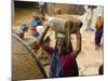 Women Construction Workers Prepare Concrete at a Site for a Multiplex Complex-null-Mounted Photographic Print